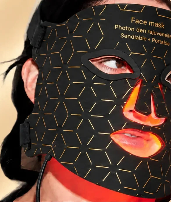 Woman wearing the Nova GEN 2 LED mask glowing red